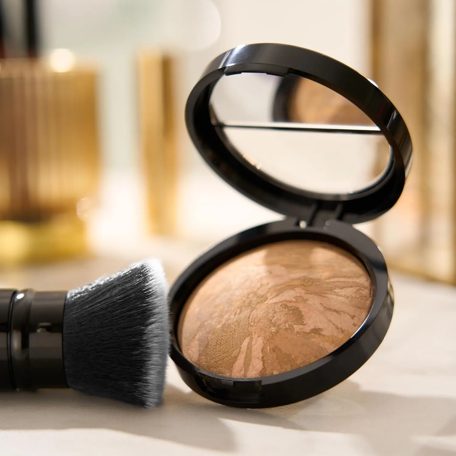 LAURA GELLER NEW YORK Baked Balance-N-Glow Illuminating Foundation - Toffee - Buildable Sheer to Light Coverage - Satin Finish